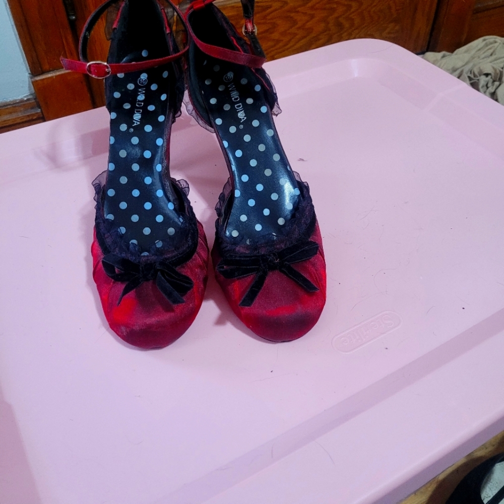 Red and black heels with a little bow